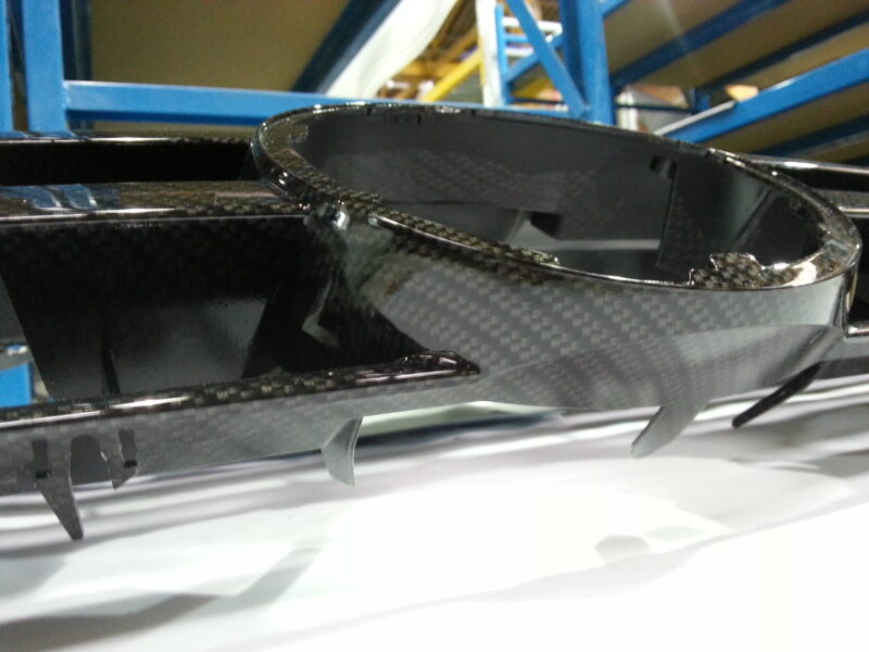 VW radiator grill coated in carbon fibre hydrographic film painted black