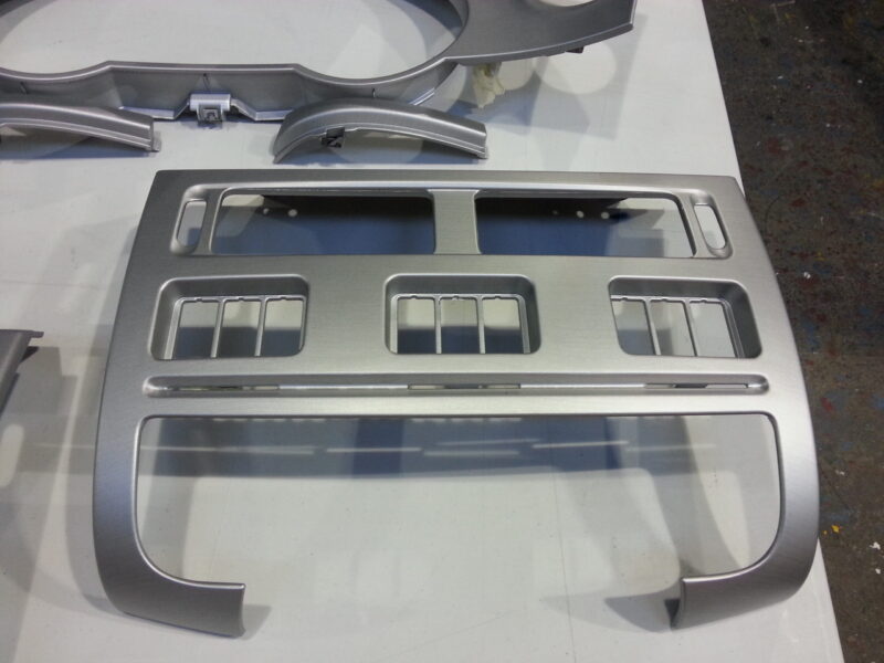 HGV dashboard elements coated in metal hydrographic film