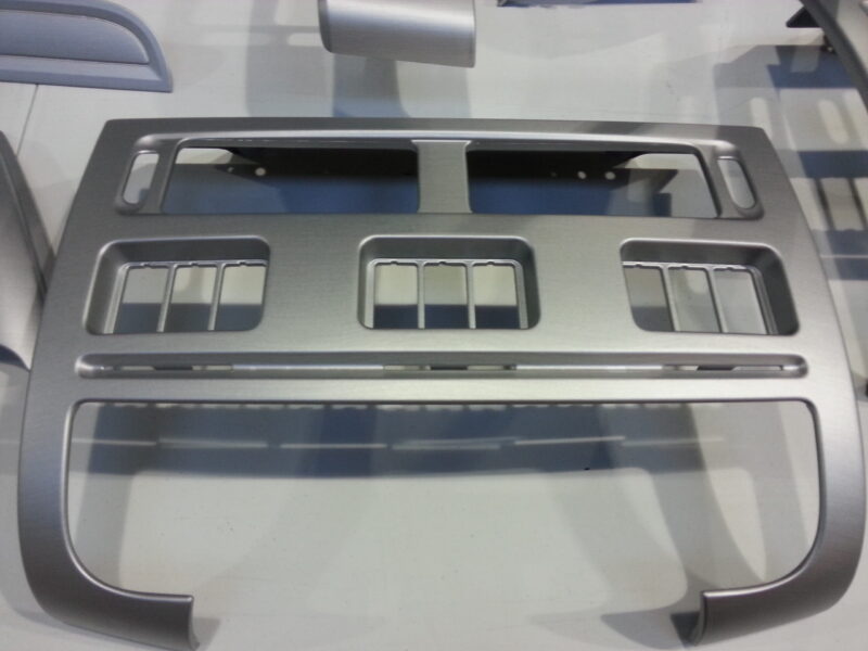 HGV dashboard elements coated in metal hydrographic film