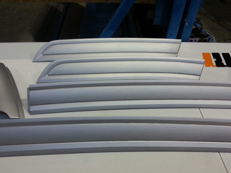 HGV dashboard elements coated in metal hydrographic film
