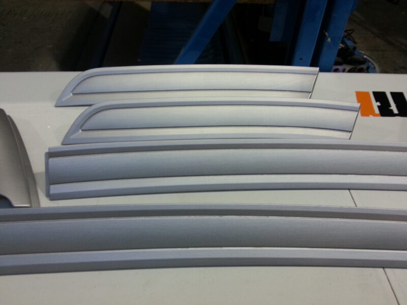HGV dashboard elements coated in metal hydrographic film