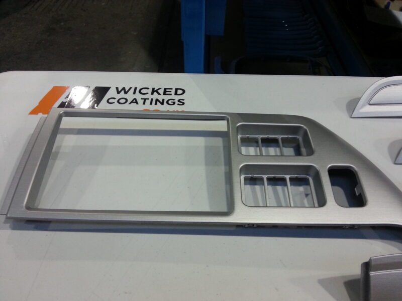 HGV dashboard elements coated in metal hydrographic film