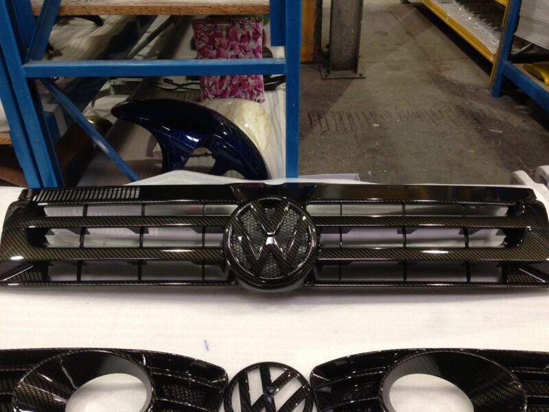 VW exterior elements coated in carbon fibre hydrographic film painted black