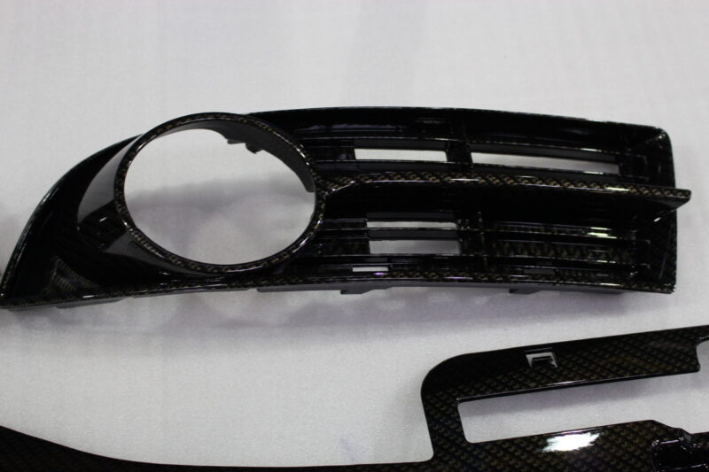 VW exterior elements coated in carbon fibre hydrographic film painted black