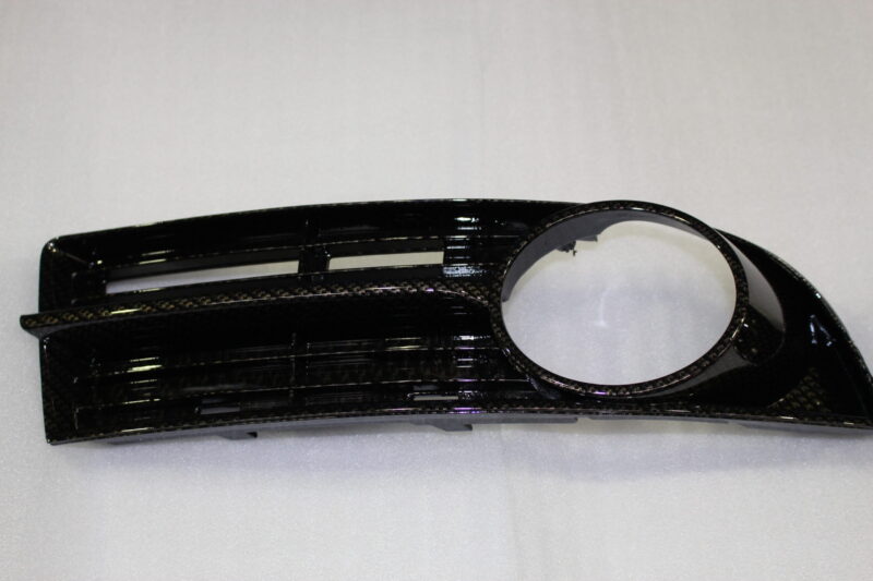 VW exterior elements coated in carbon fibre hydrographic film painted black
