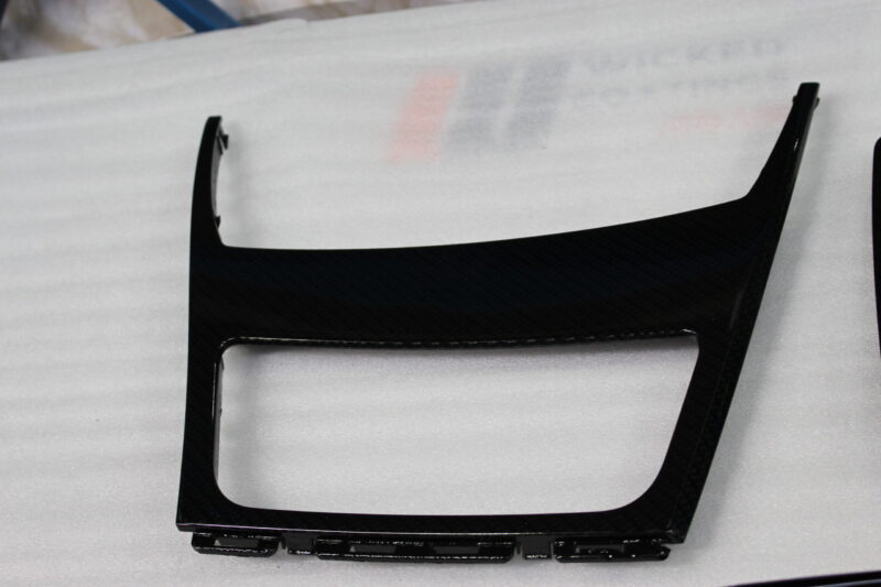 Car interior various elements coated in carbon fibre hydrographic film painted black