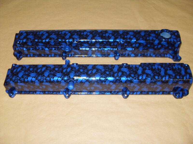 Car engine parts coated in skull hydrographic film painted blue
