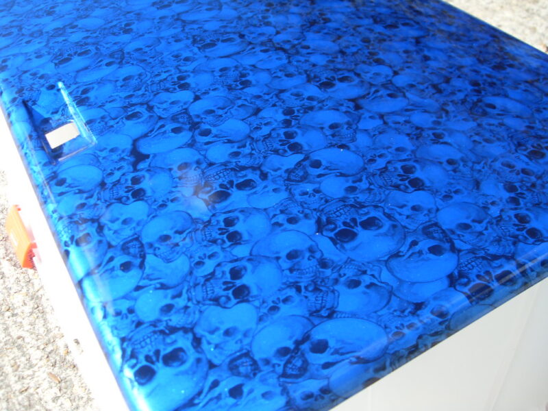 Car engine parts coated in skull hydrographic film painted blue