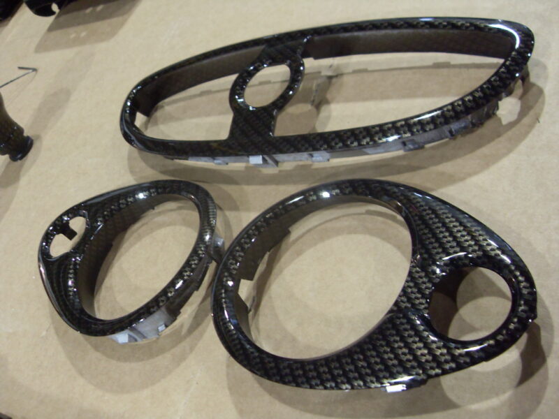 Car interior various elements coated in carbon fibre hydrographic film