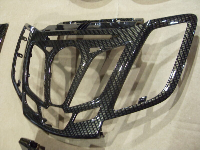 Car interior various elements coated in carbon fibre hydrographic film