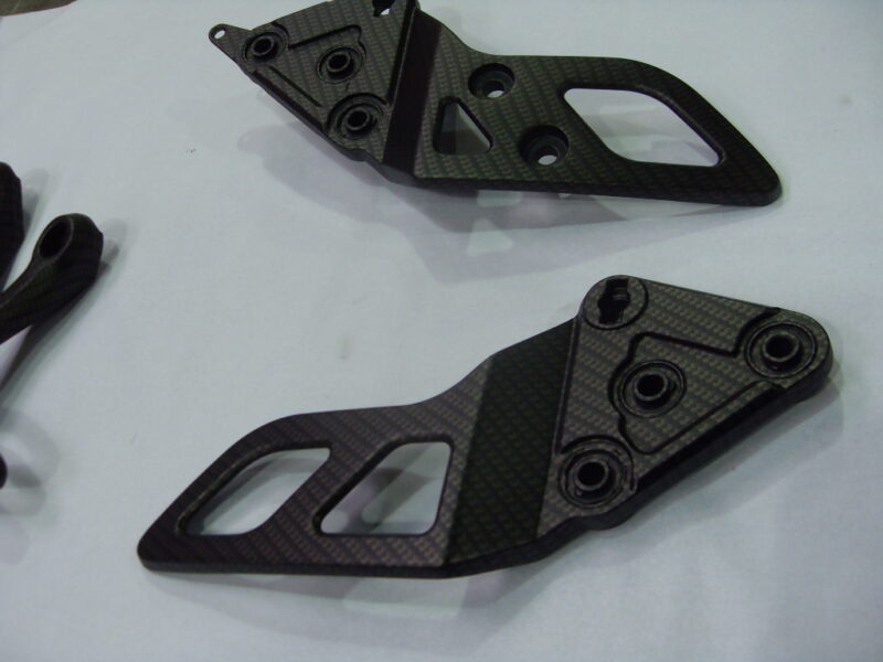 Motorbike various elements coated in carbon fibre hydrographic film painted black