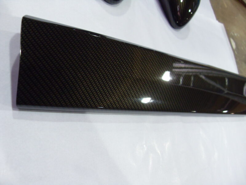 Motorbike various elements coated in carbon fibre hydrographic film painted black