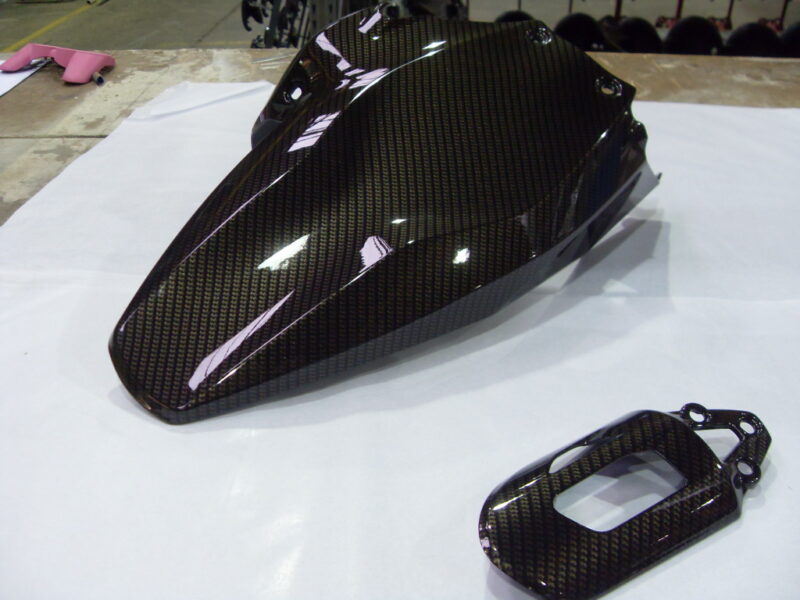 Motorbike various elements coated in carbon fibre hydrographic film painted black