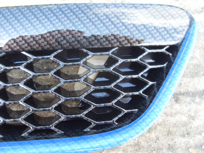 Ford Focus ST radiator grill coated in carbon fibre hydrographic film painted black