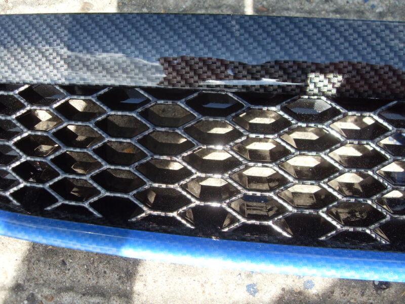 Ford Focus ST radiator grill coated in carbon fibre hydrographic film painted black