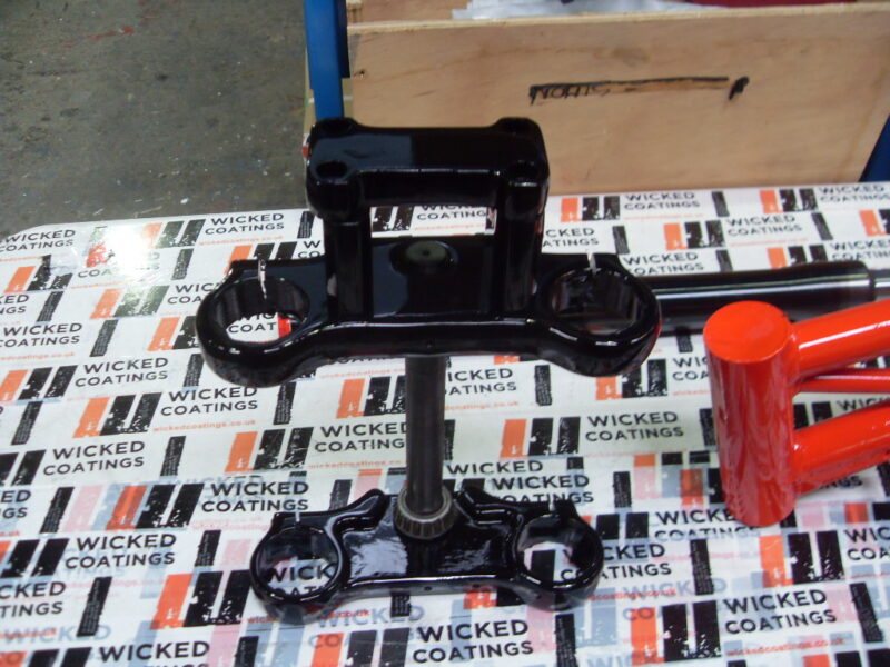 Motorbike frame painted in black and red