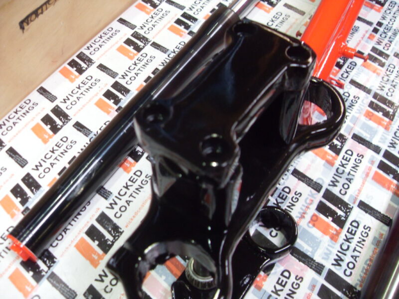 Motorbike frame painted in black and red