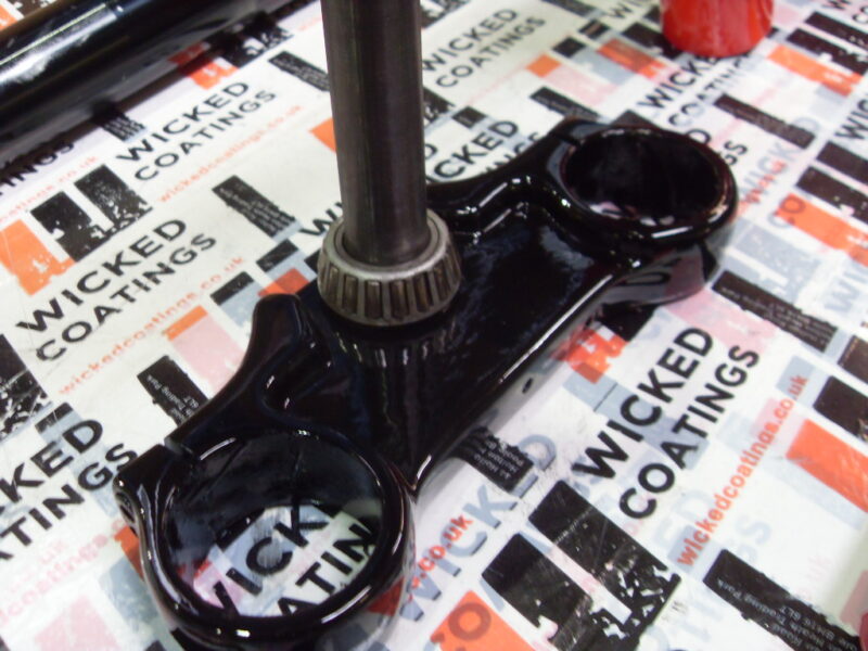 Motorbike frame painted in black and red