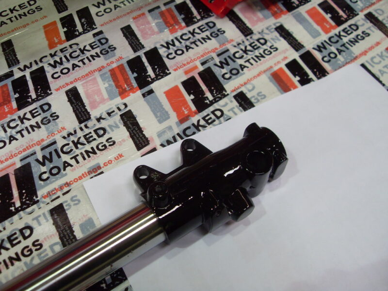 Motorbike frame painted in black and red