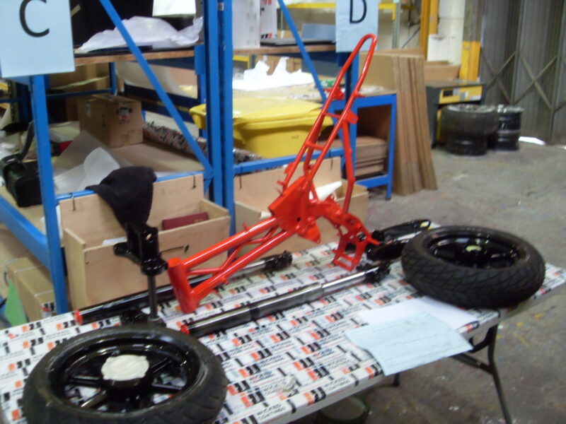 Motorbike frame painted in black and red