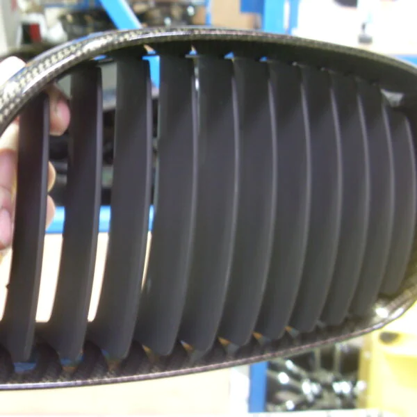 BMW radiator grill coated in carbon fibre hydrographic film painted black