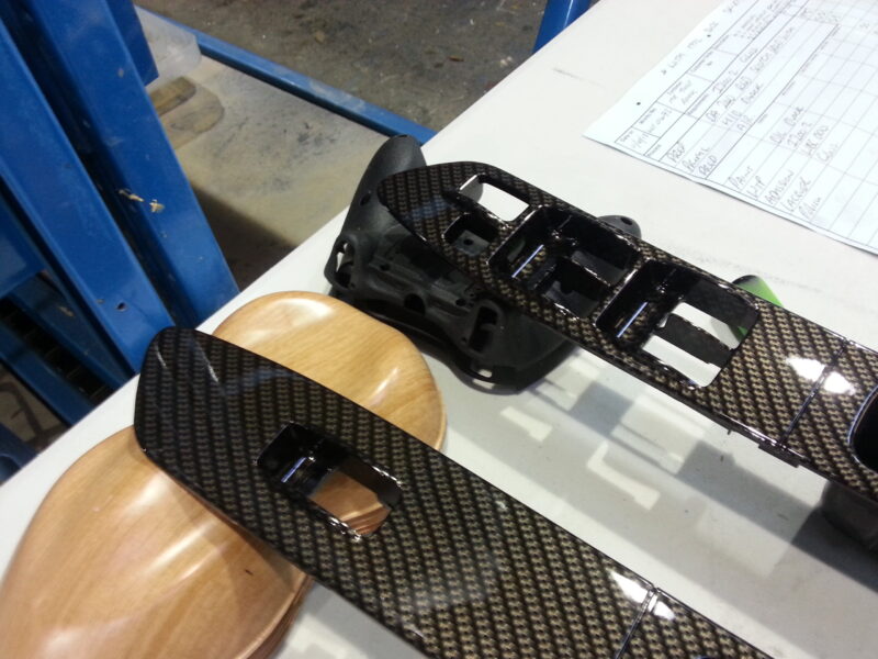 Car interior various elements coated in carbon fibre hydrographic film painted black