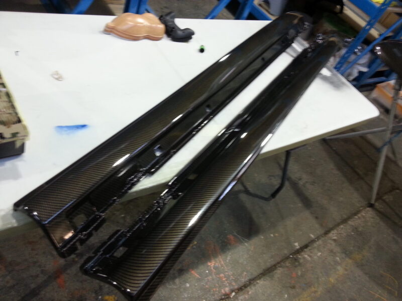 Car interior various elements coated in carbon fibre hydrographic film painted black
