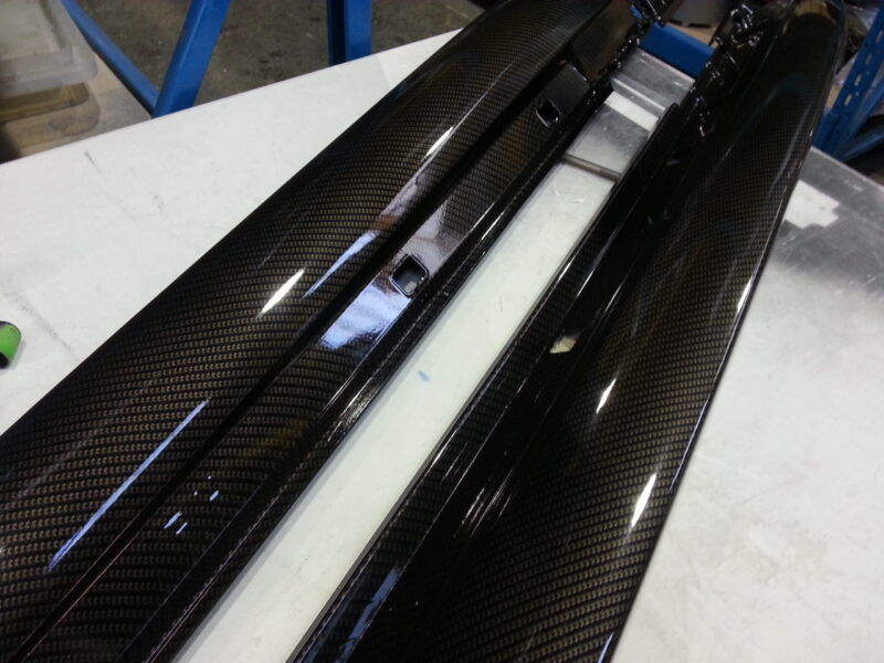 Car interior various elements coated in carbon fibre hydrographic film painted black